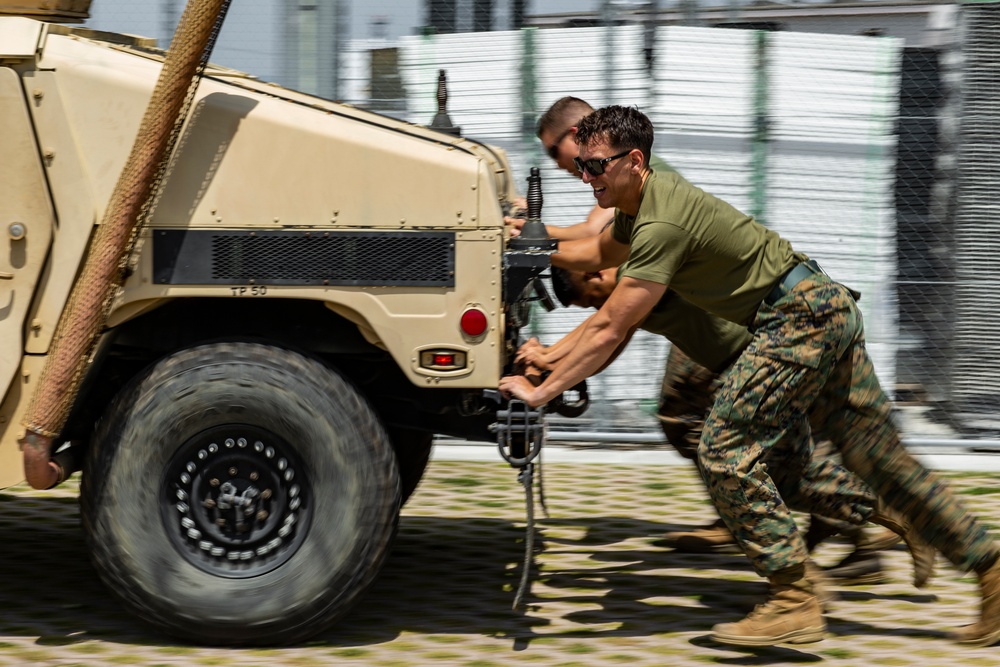 MAG-12 conducts Humvee push for 1st MAW warrior games