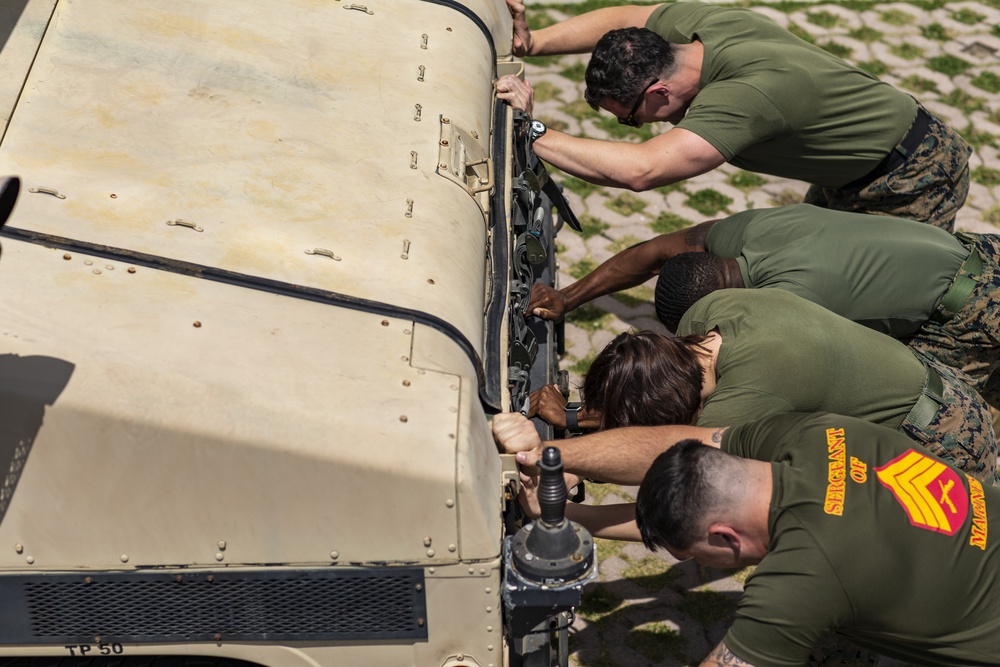 MAG-12 conducts Humvee push for 1st MAW warrior games