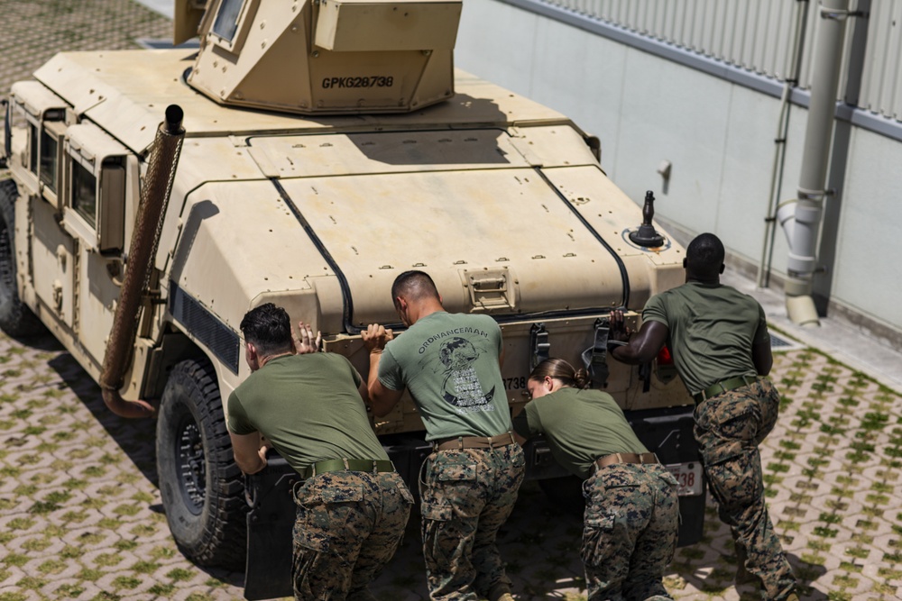 MAG-12 conducts Humvee push for 1st MAW warrior games