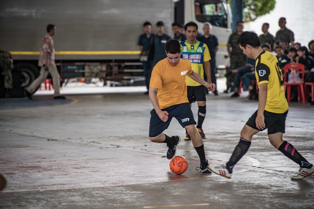 Sailors from USS PIONEER (MCM 9) Play Soccer during COMREL in Pattaya, Thailand