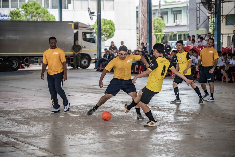 Sailors from USS PIONEER (MCM 9) Play Soccer during COMREL in Pattaya, Thailand