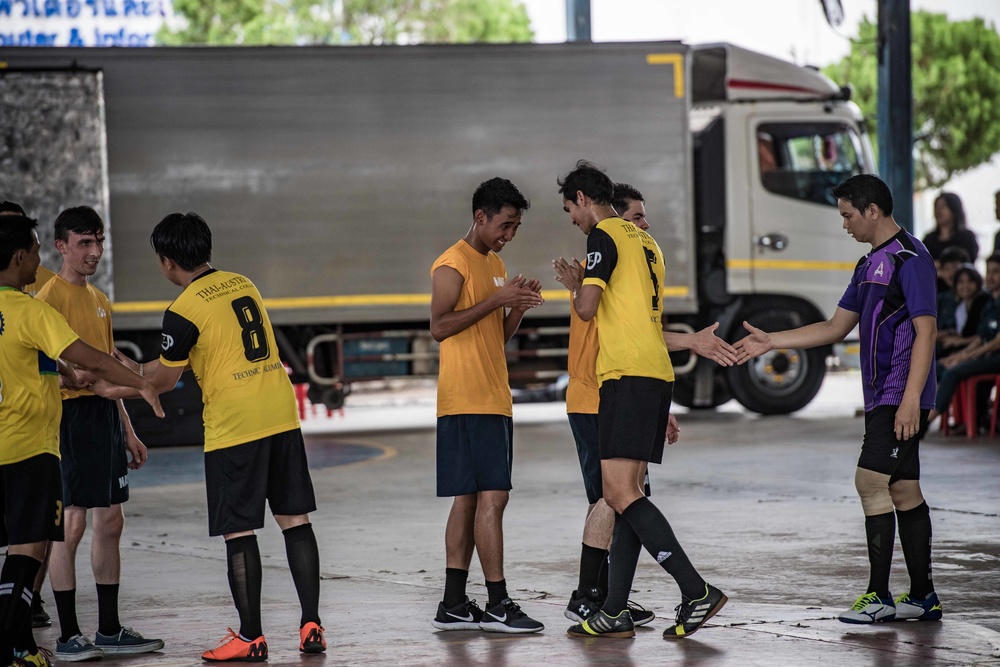 Sailors from USS PIONEER (MCM 9) Play Soccer during COMREL in Pattaya, Thailand
