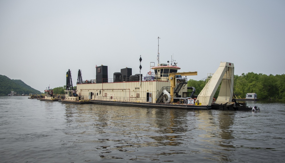 Dredging and surveying to maintain the Mississippi River navigation channel