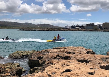 Imagery Available: Coast Guard, Honolulu emergency services respond to capsized vessel off Oahu