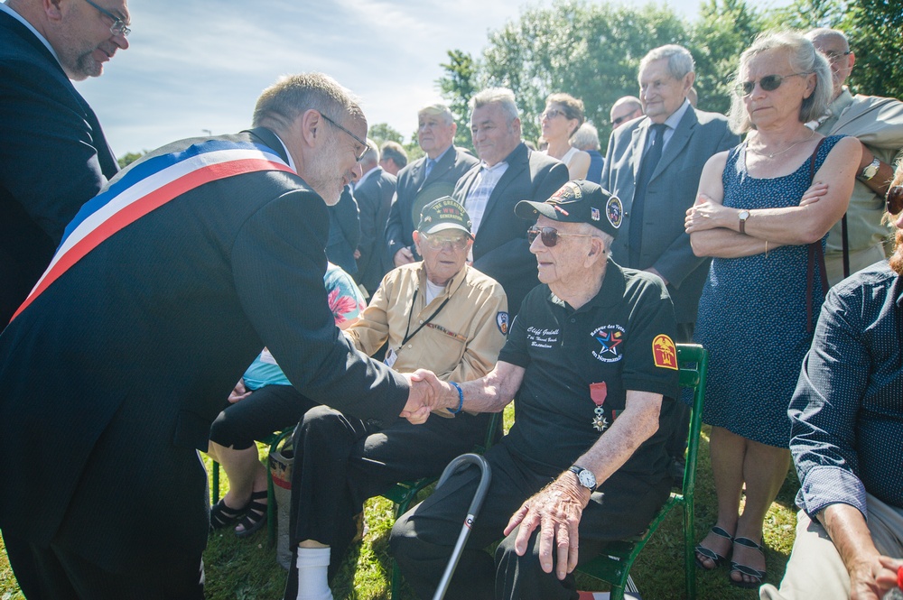 Mr. Goodall, WWII veteran, shakes hands