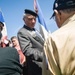 Ceremony participants greet World War II veterans