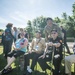 Special Forces Soldier takes photo with World War II Vets