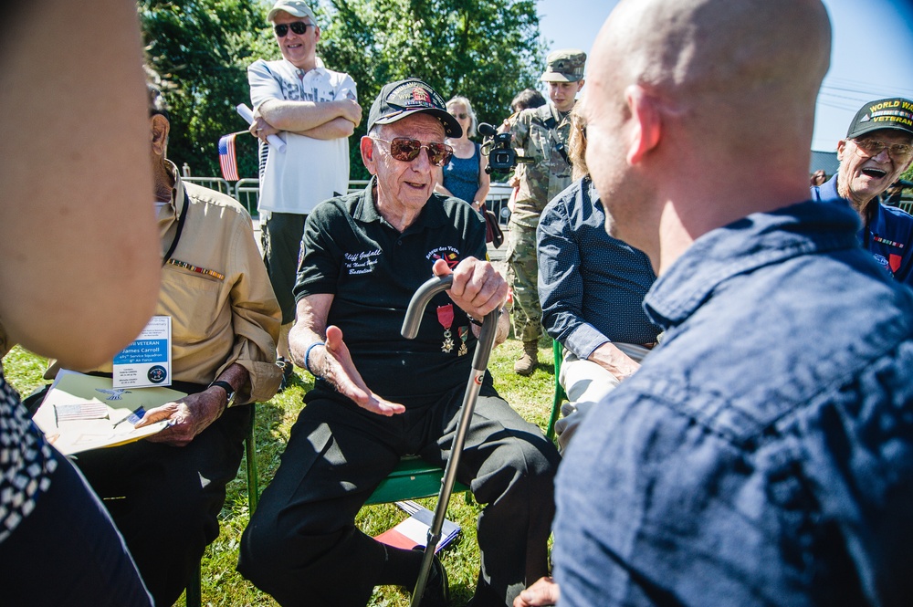 Clifford Goodall talks with service member