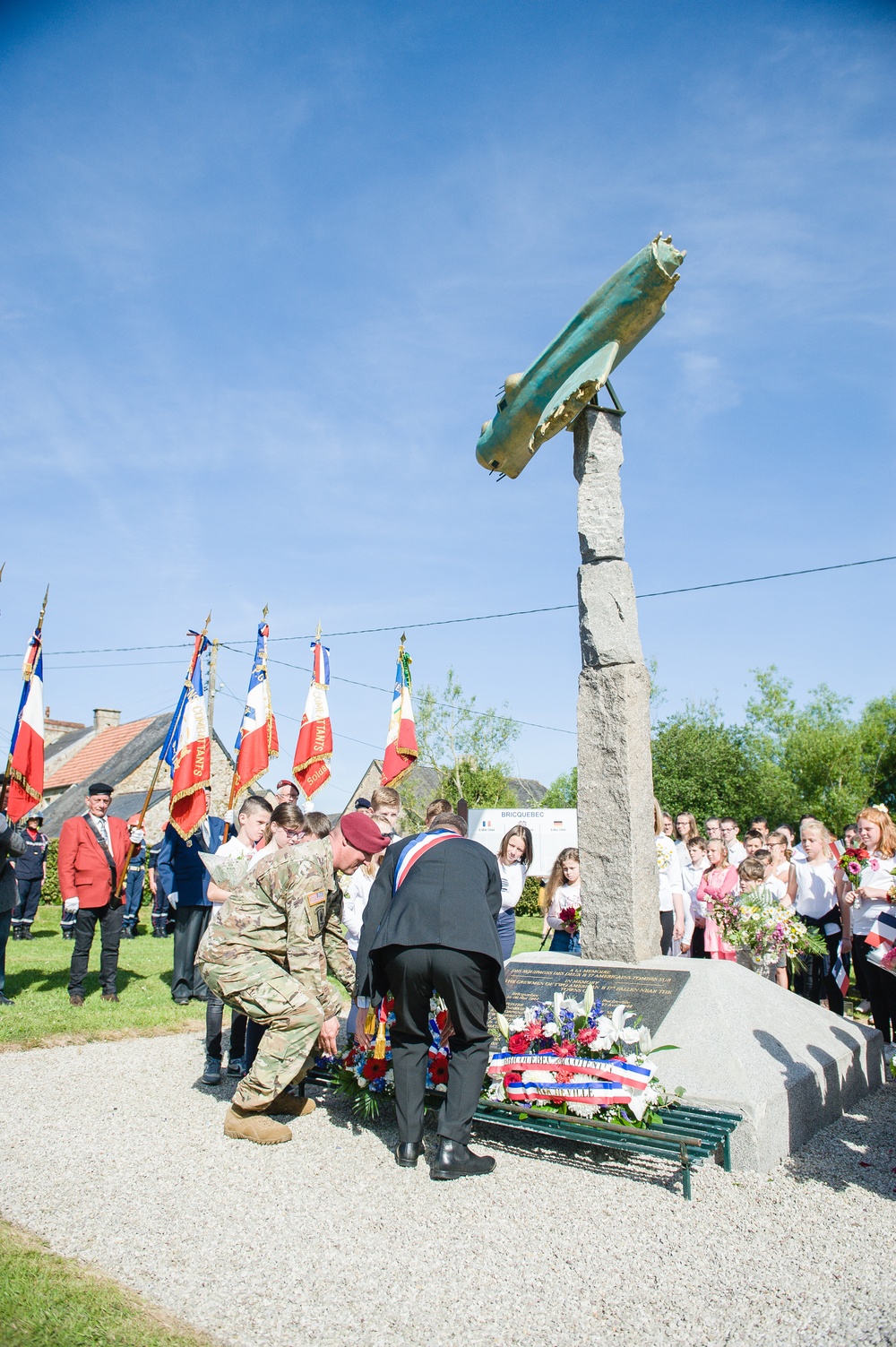 Leaders lay wreath during ceremony