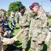 Paratrooper speaks with World War II Veteran