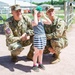 101st Soldiers take photo with French girl