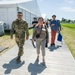 French speaking Soldier escorts media