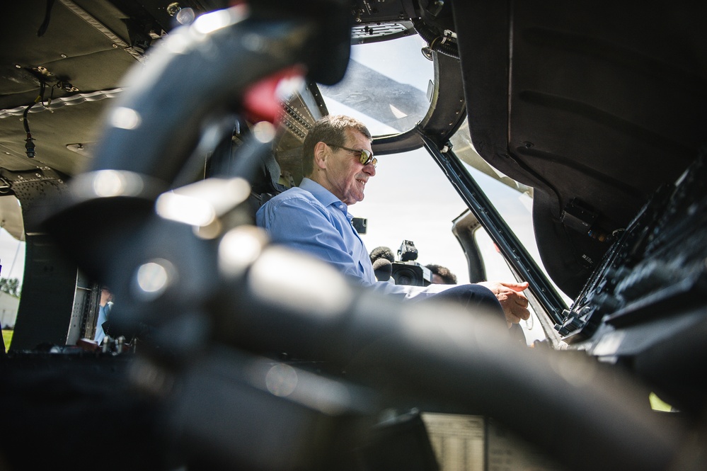 Carentan Mayor sits in UH-60