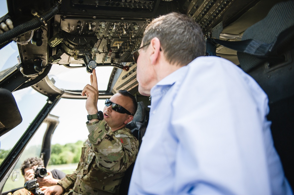 Carentan Mayor takes quick lesson on helicopter