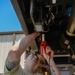 Vehicle Maintenance Airmen Work on Equipment