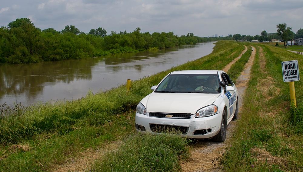 Illinois National Guard Soldiers patrol levee system