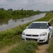 Illinois National Guard Soldiers patrol levee system