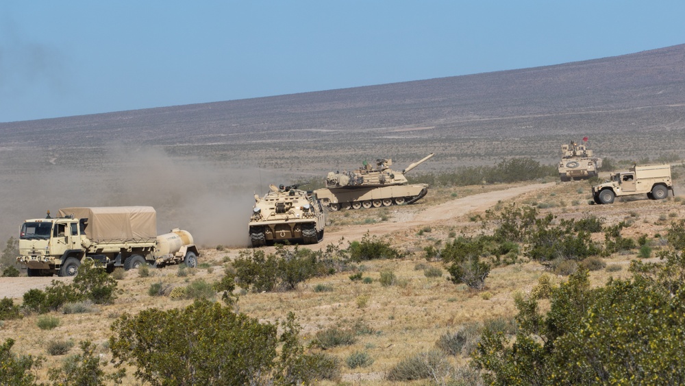 Oregon Army National Guard Soldiers from Bravo and Charlie companies, 3-116th Cavalry Regimentconduct armored troop leading procedures and dismounted infantry operations.