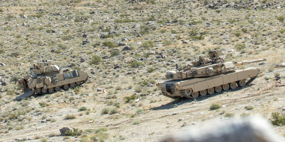 Oregon Army National Guard Soldiers from Bravo and Charlie companies, 3-116th Cavalry Regimentconduct armored troop leading procedures and dismounted infantry operations.