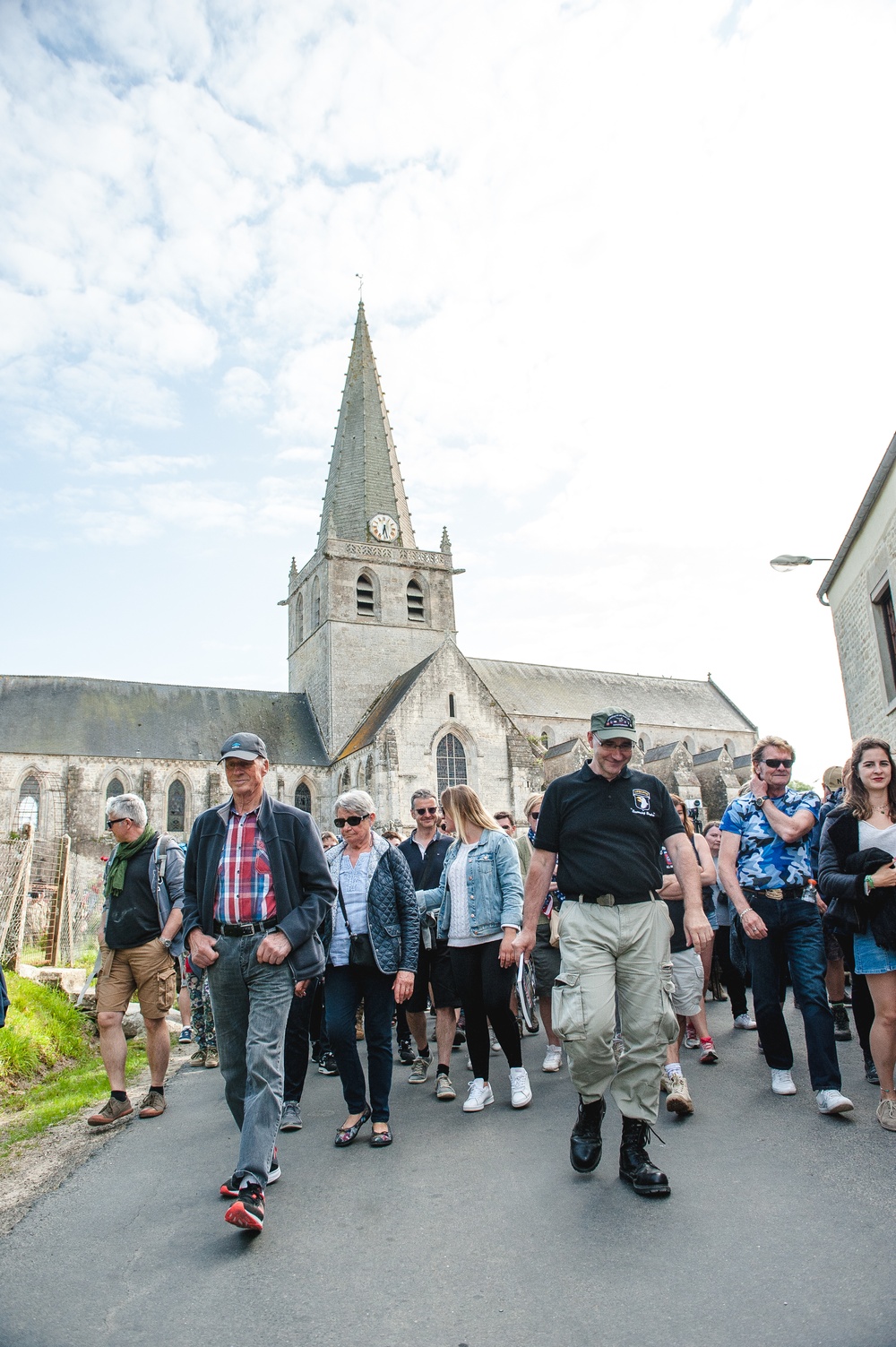 French Tour Guide Leads a Crowd