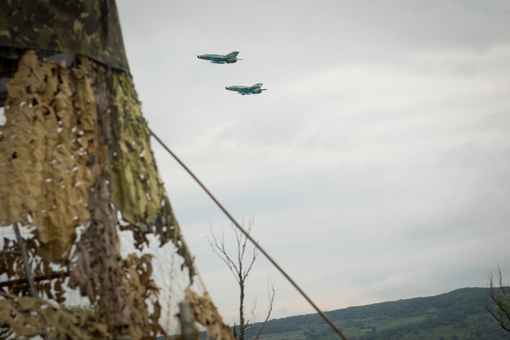 Two Romanian Air Force Aircraft flyover the opening ceremony of Saber Guardian 2019