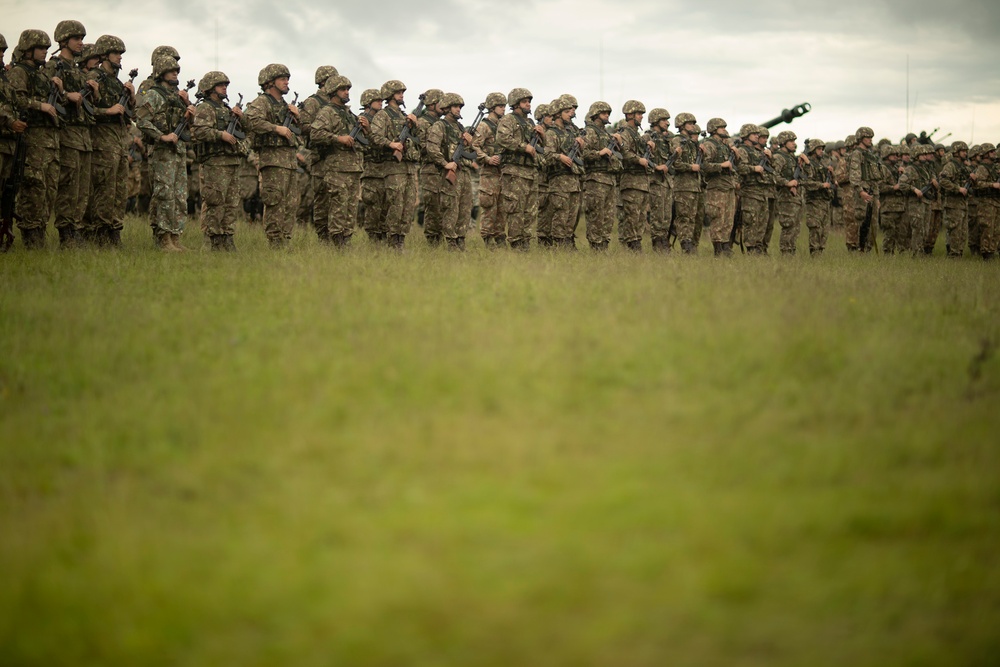 Romanian Land Force Soldiers partake in the opening ceremony of Saber Guardian 2019.