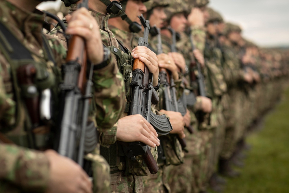 Romanian Land Force Soldiers partake in the opening ceremony of Saber Guardian 2019