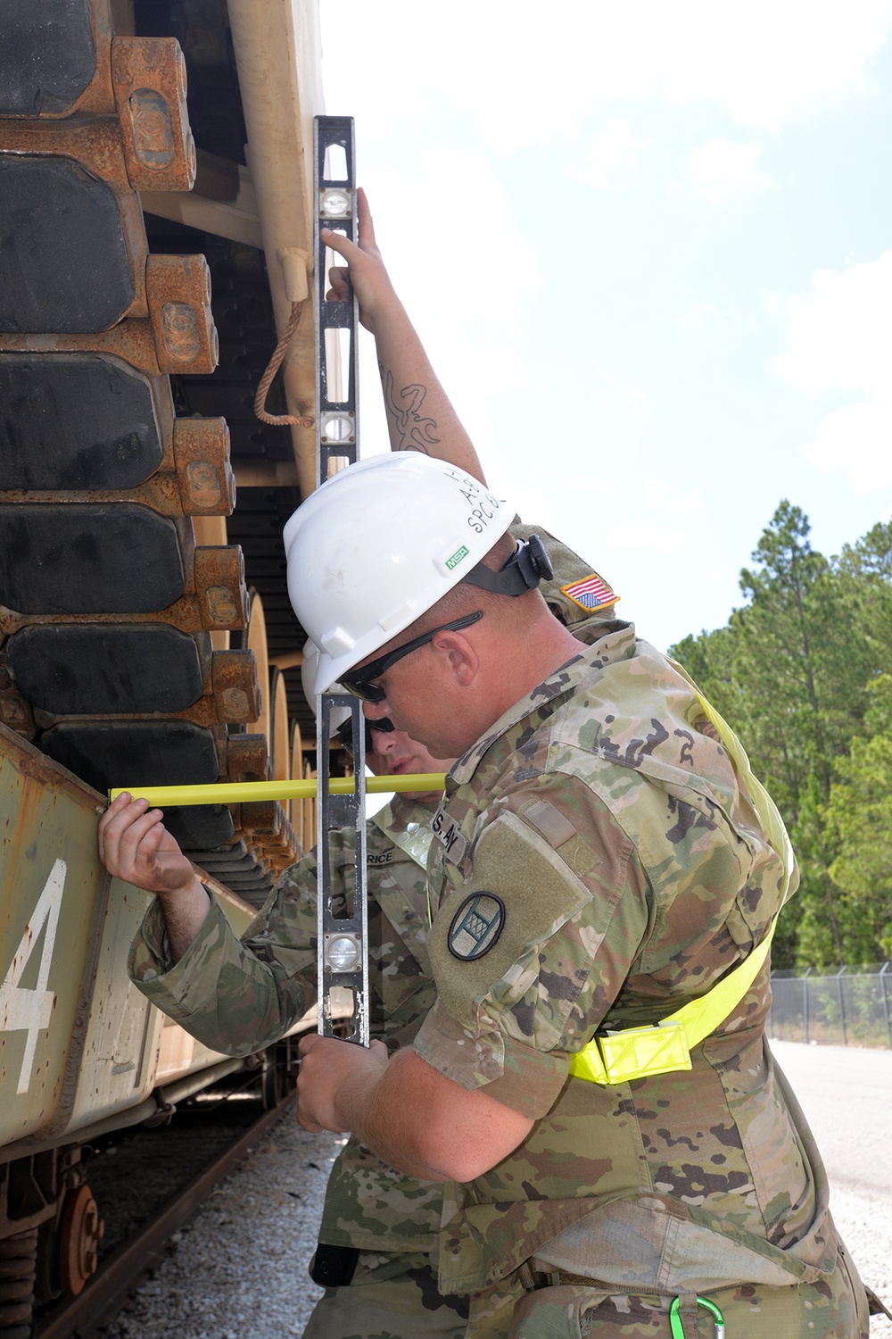 NC Guard Soldiers Rail Load Armor, Vehicles for National Training Center Deployment