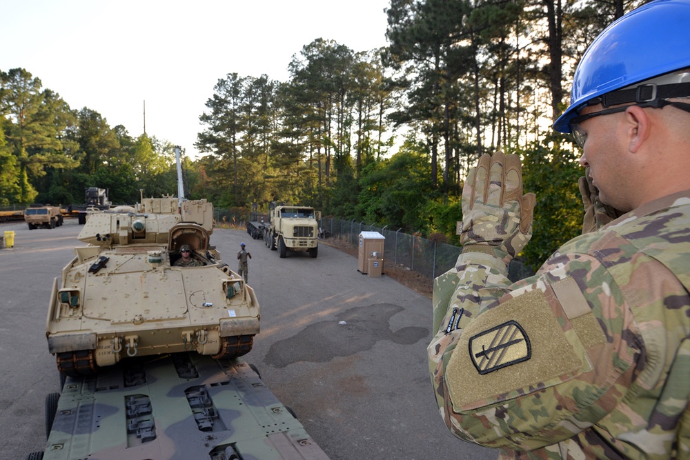 NC Guard Soldiers Rail Load Armor, Vehicles for National Training Center Deployment