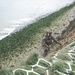 Ranger climbs Pointe du Hoc