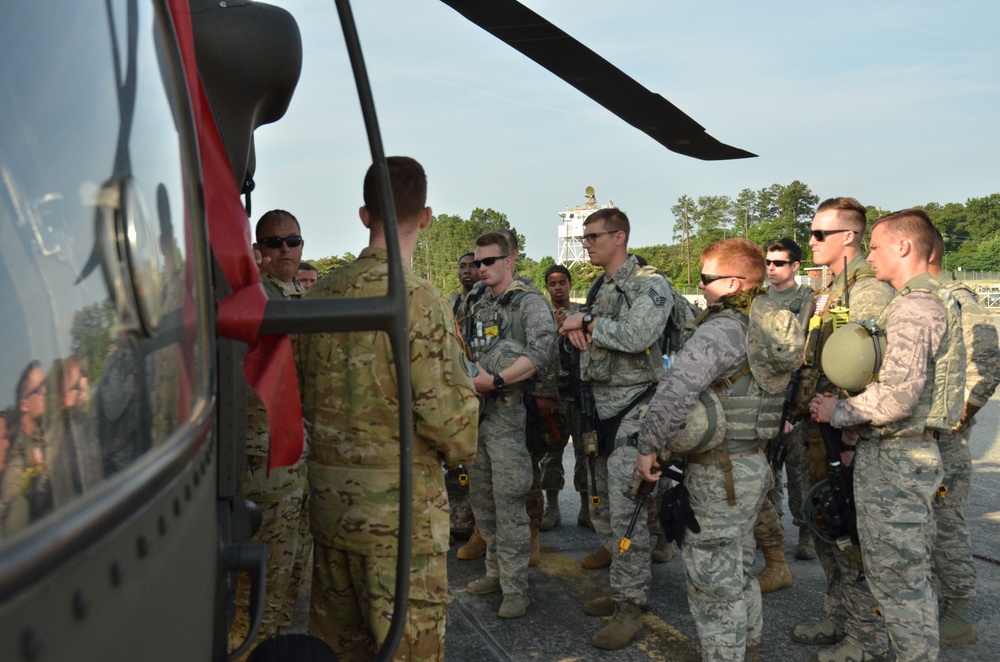 Security Forces Airmen conduct HH-60 combat offload training