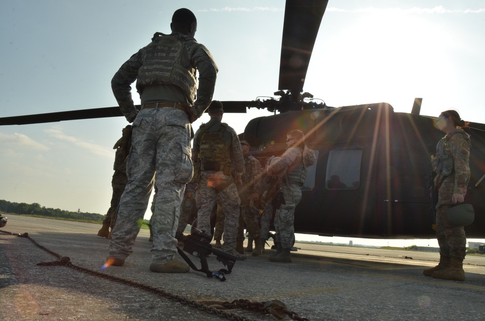 Security Forces Airmen conduct HH-60 combat offload training