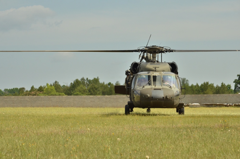 Security Forces Airmen conduct HH-60 combat offload training