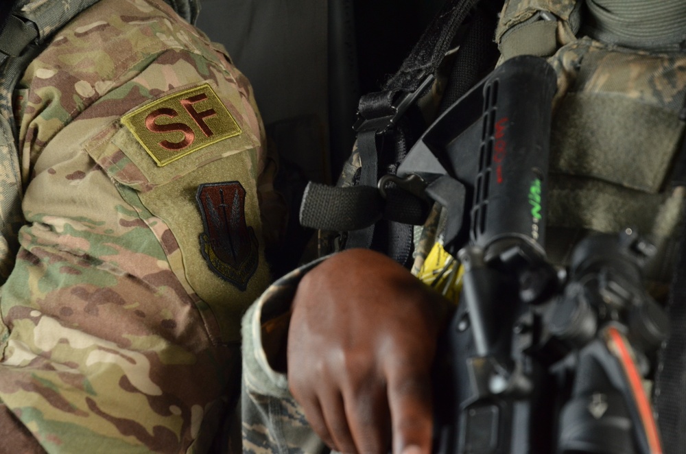 Security Forces Airmen conduct HH-60 combat offload training