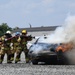 Firefighters put out car fires during Exercise Global Dragon 2019