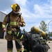 Firefighters put out car fires during Exercise Global Dragon 2019