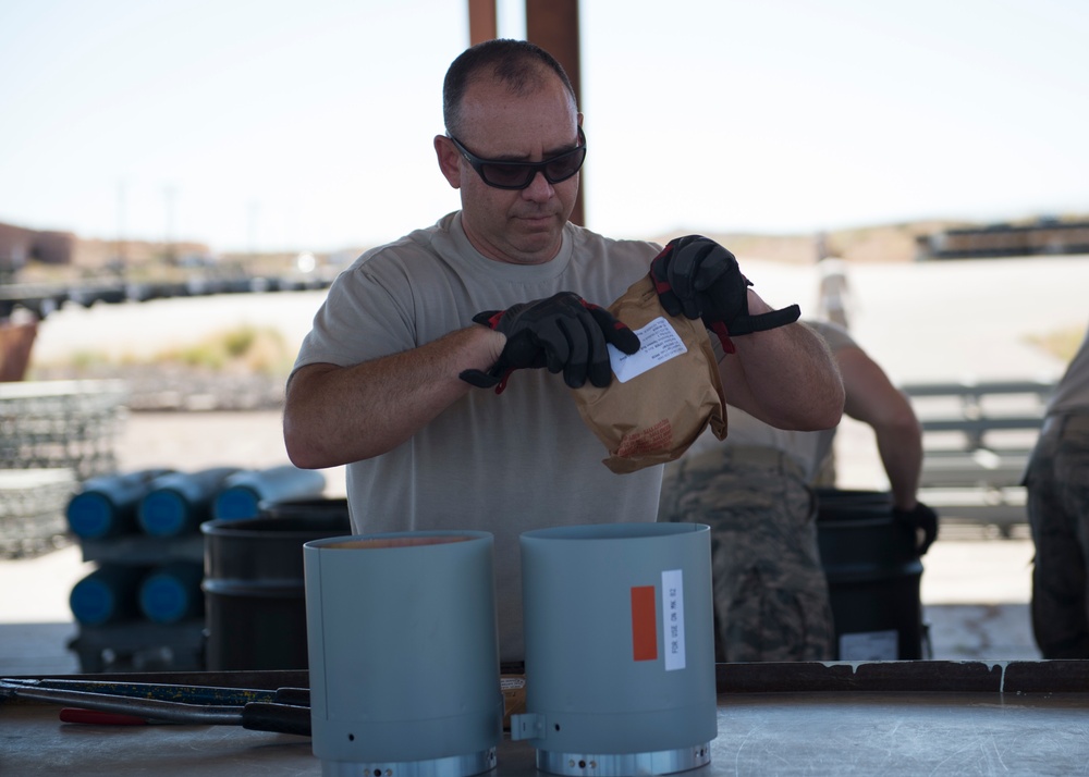 IDANG ammo troops build bombs at Nellis AFB