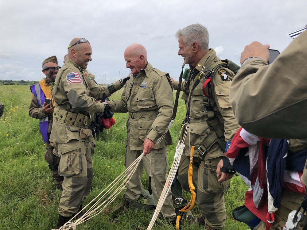 U.S. Army's 101st Airborne Division veteran, 97, jumps out of a plane to recreate his D-Day parachute drop