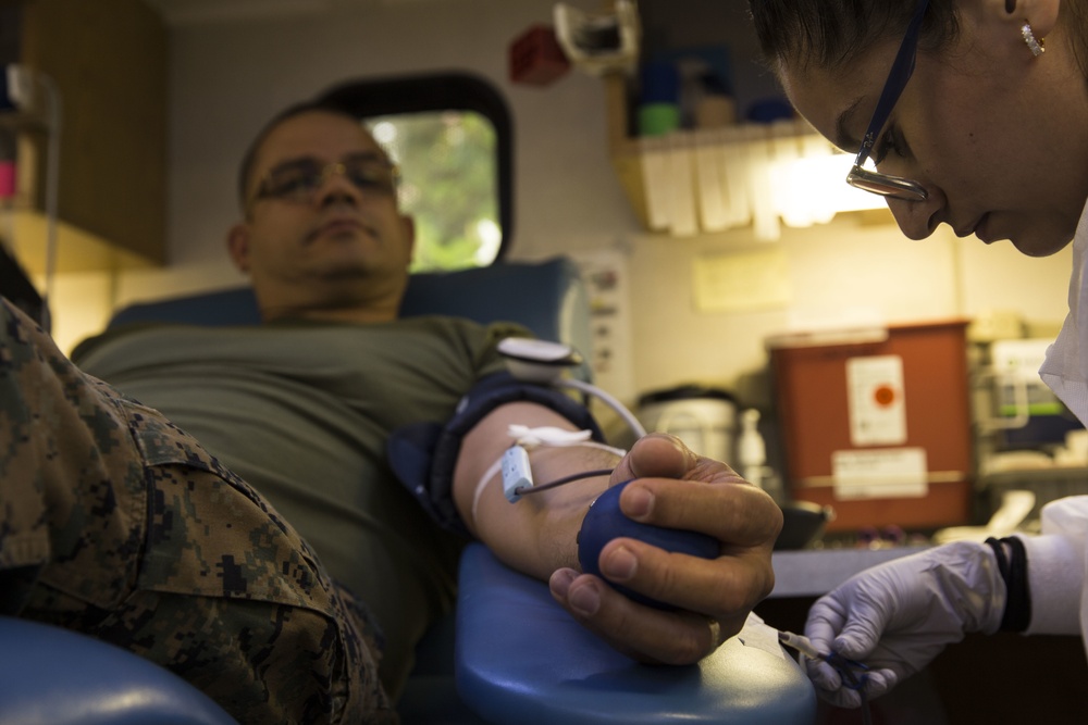 Marines and Sailors donate blood for the Armed Services Blood Program (ASBP)