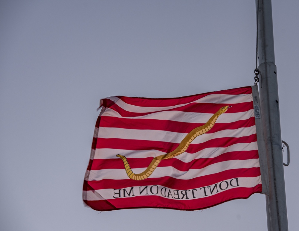 First Navy Jack Flies Half-Mast