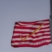 First Navy Jack Flies Half-Mast