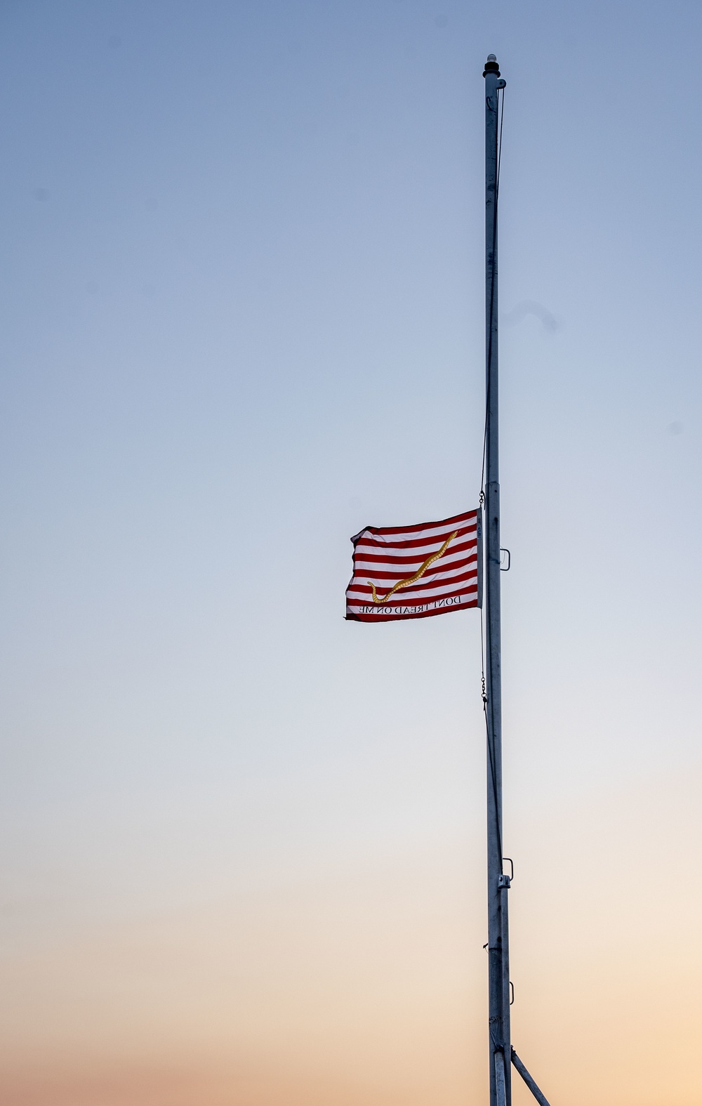 First Navy Jack Flies Half-Mast