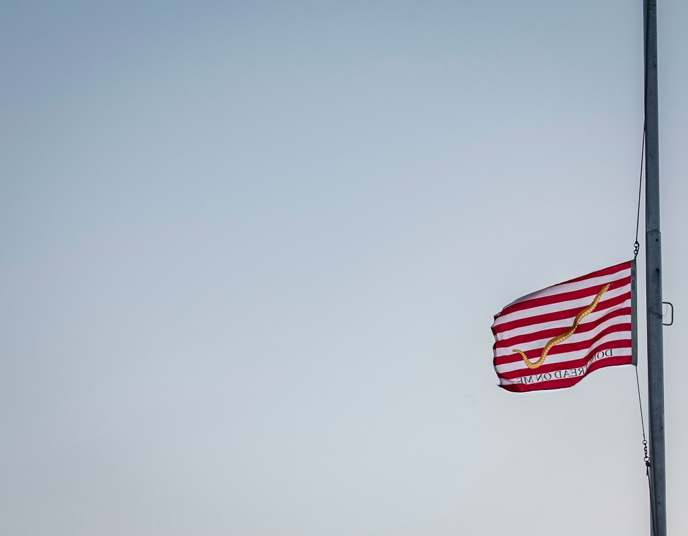 First Navy Jack Flies Half-Mast