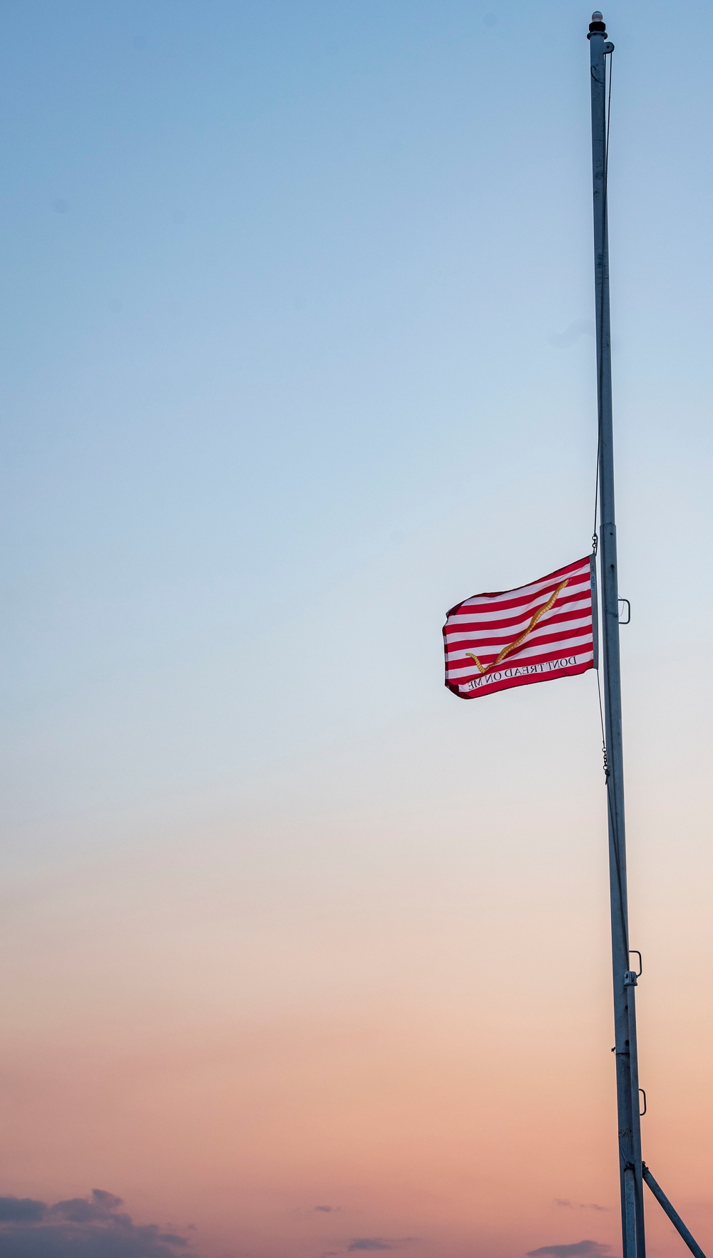 First Navy Jack Flies Half-Mast