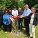 Members of ALCOSAN, the Pittsburgh City Council, and Pittsburgh District USACE turn the valve on the Sheraden Park Aquatic Ecosystem Restoration Project.
