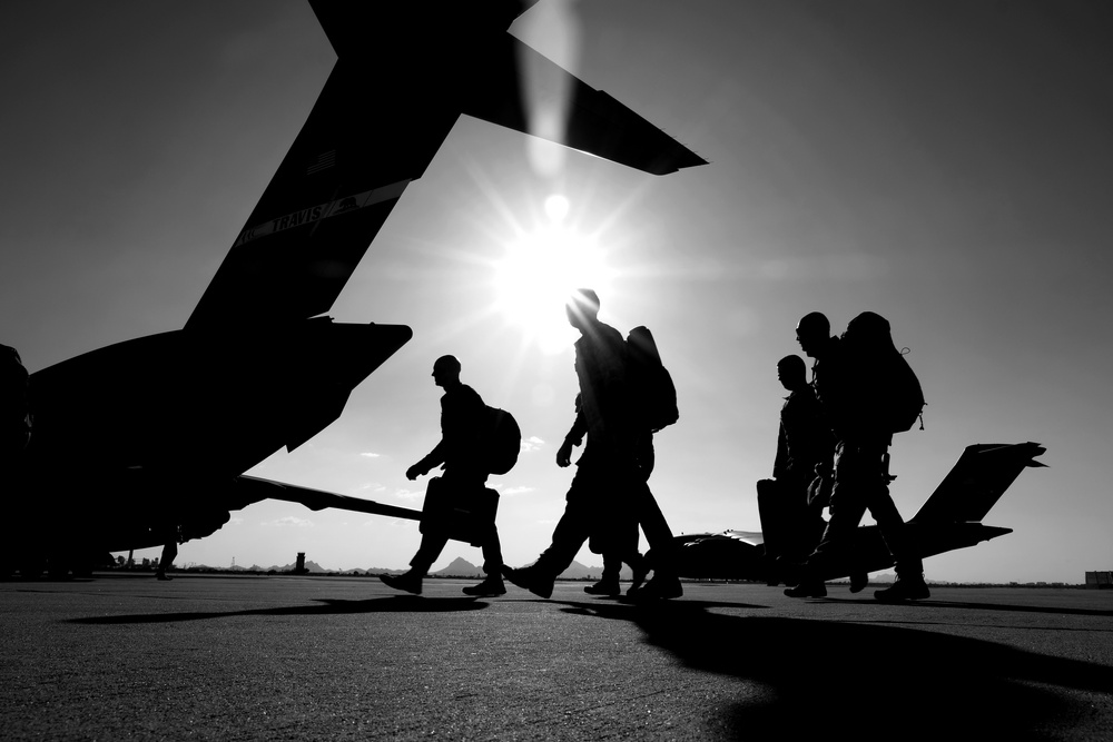 Members of the 306th Rescue Squadron deploy from Davis-Monthan AFB