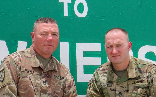 Father, Son Strengthen Bond While Deployed Together