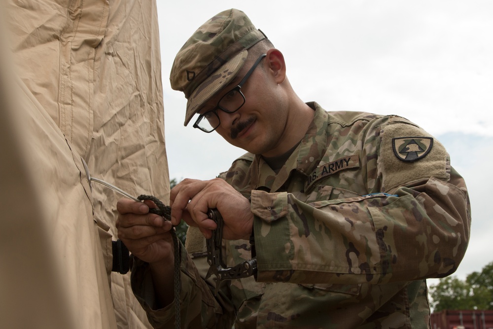 Pfc. Secures Tent
