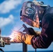 Sailors Weld Aboard USS Harpers Ferry