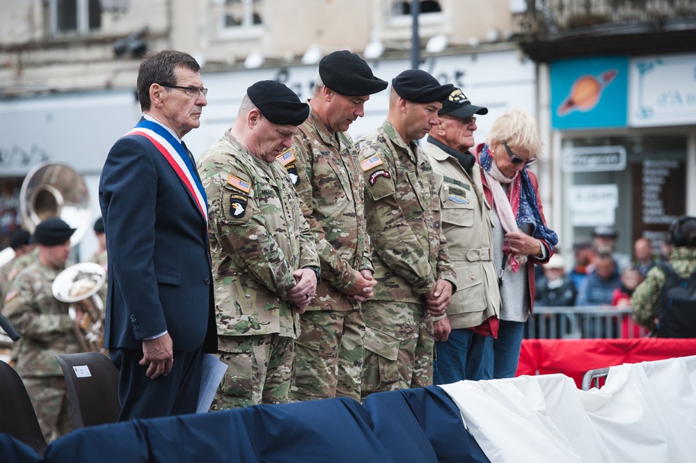 Praying at Carentan Ceremony